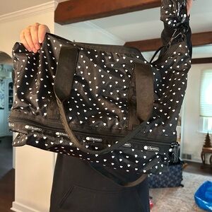 LeSportsac Black Duffel Bag with White Heart Pattern